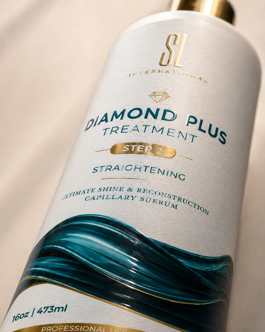 Diamond Plus straightening treatment bottle with deep teal and gold packaging design
